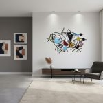 This stylish room blends contemporary art with clean lines. The large abstract metal sculpture and matching framed prints create a gallery feel. A low-profile console and elegant armchair offer functionality, while the neutral palette and ample space evoke calm and sophistication.