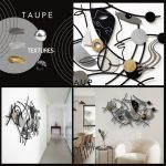 A contemporary hallway is brightened by a striking Picasso-style wall sculpture, featuring abstract faces, bold lines, and metallic accents in black, gold, and silver. The piece becomes a focal point, adding artistic flair above neutral flooring and minimalist furniture, while natural light enhances the unique design.